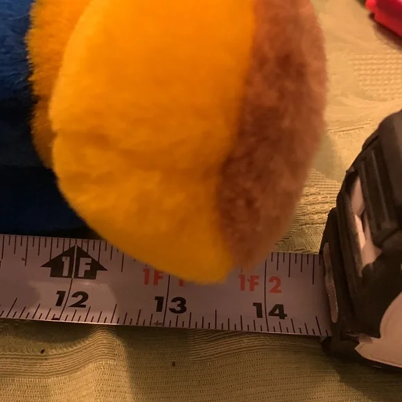 Charming Nostalgia: Woody Woodpecker Plush Collectible Cartoon Character.